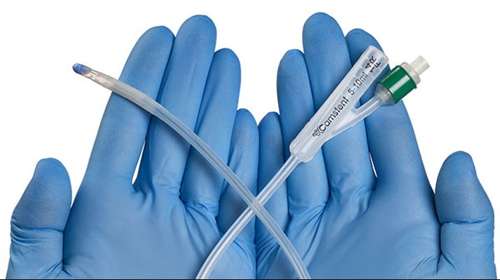 Camstent catheter on surgical gloves