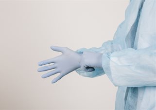 Surgeon wearing gloves - image from Freepix