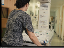 clinician pushing equipment